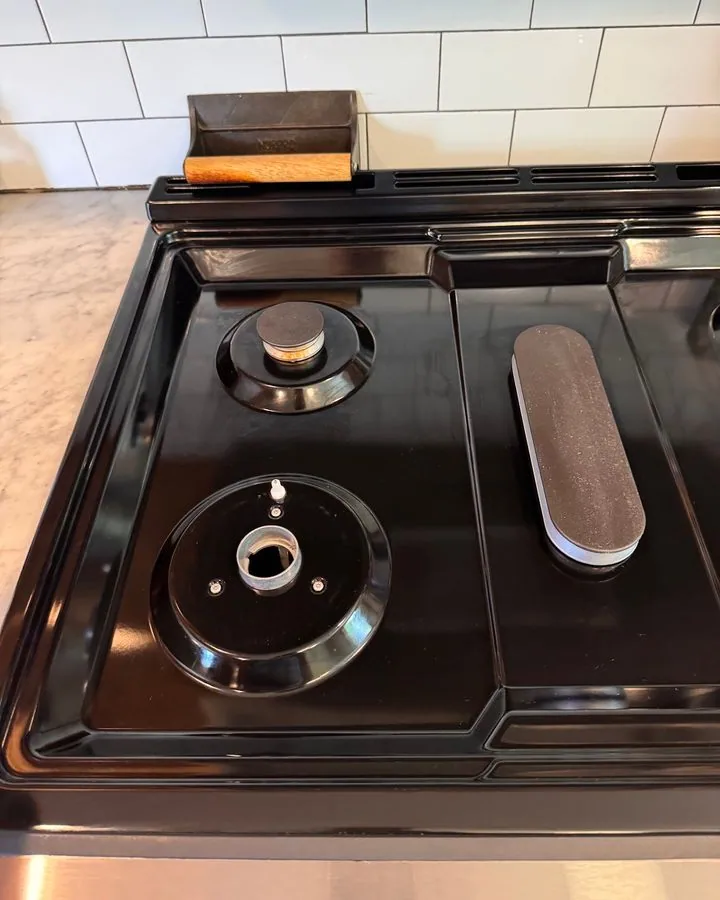 Close view of a clean gas cooktop