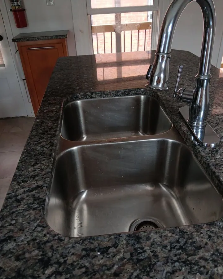 Granite counter with a clean double sink